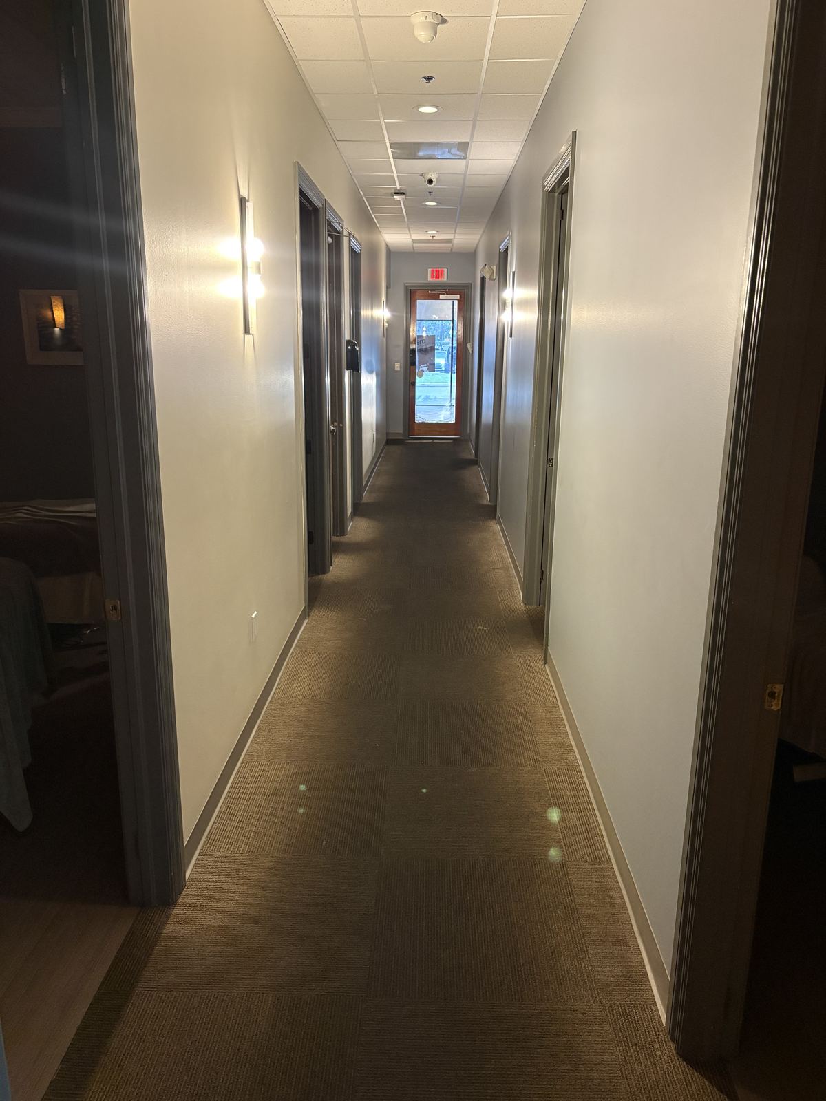 Hallway carpet in an Aventura office building, before cleaning