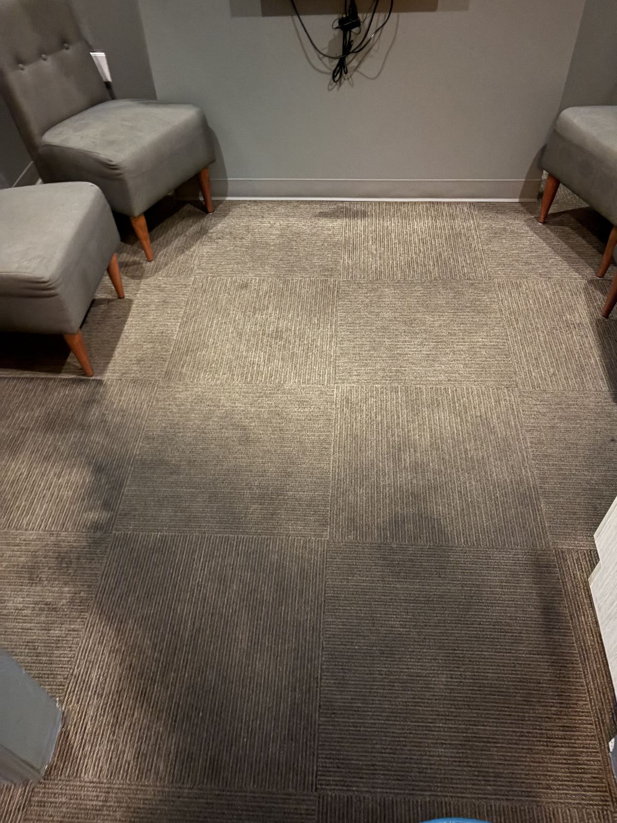 Waiting room carpet in Aventura with a dark traffic path, before cleaning